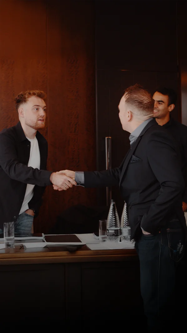 Anthony greeting a participant at a previous Keystone event