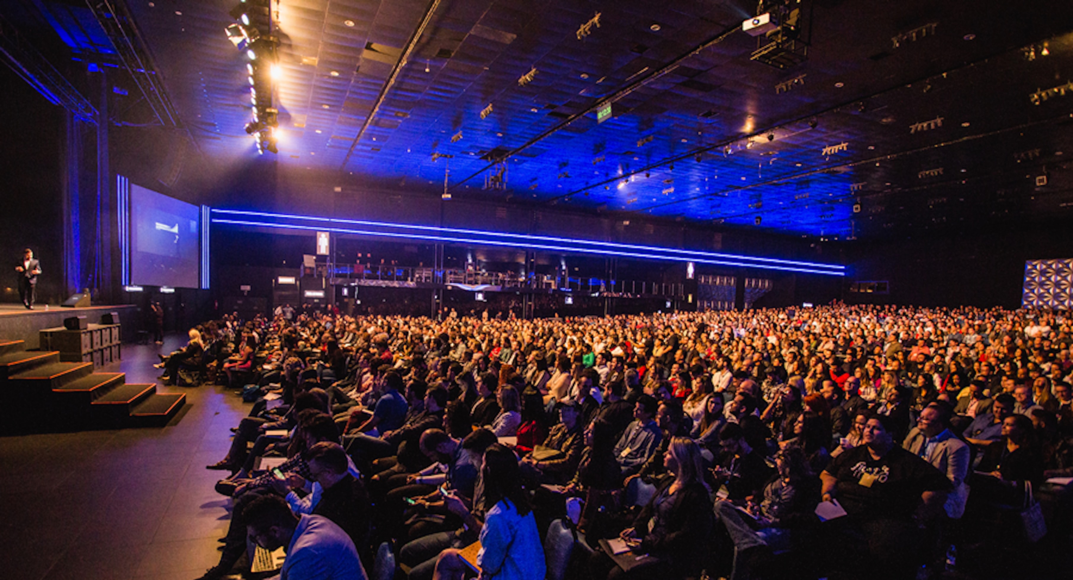 Guest speaker addressing a conference audience